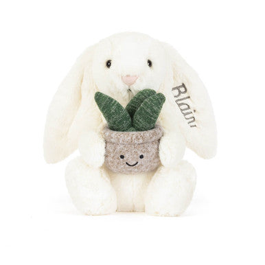 Lapin crème personnalisé avec plante